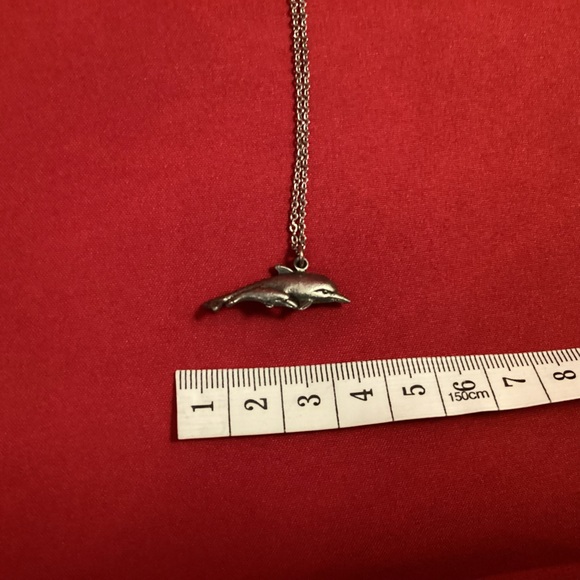 Silver tone gray dolphin pendant on a silver tone chain - Picture 5 of 5
